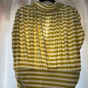 This season, Anthropologie by Maeve striped mock neck with keyhole back.